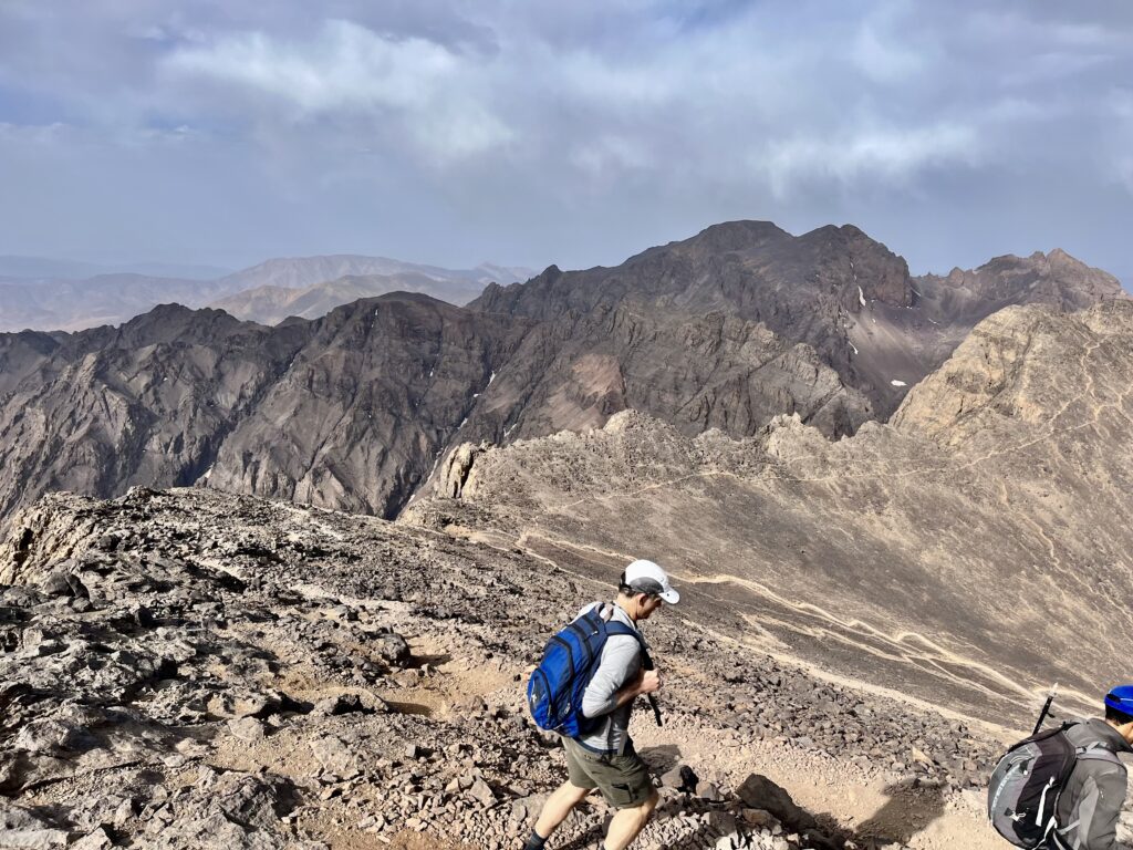 A man descends Mt. Toubkal's summit.