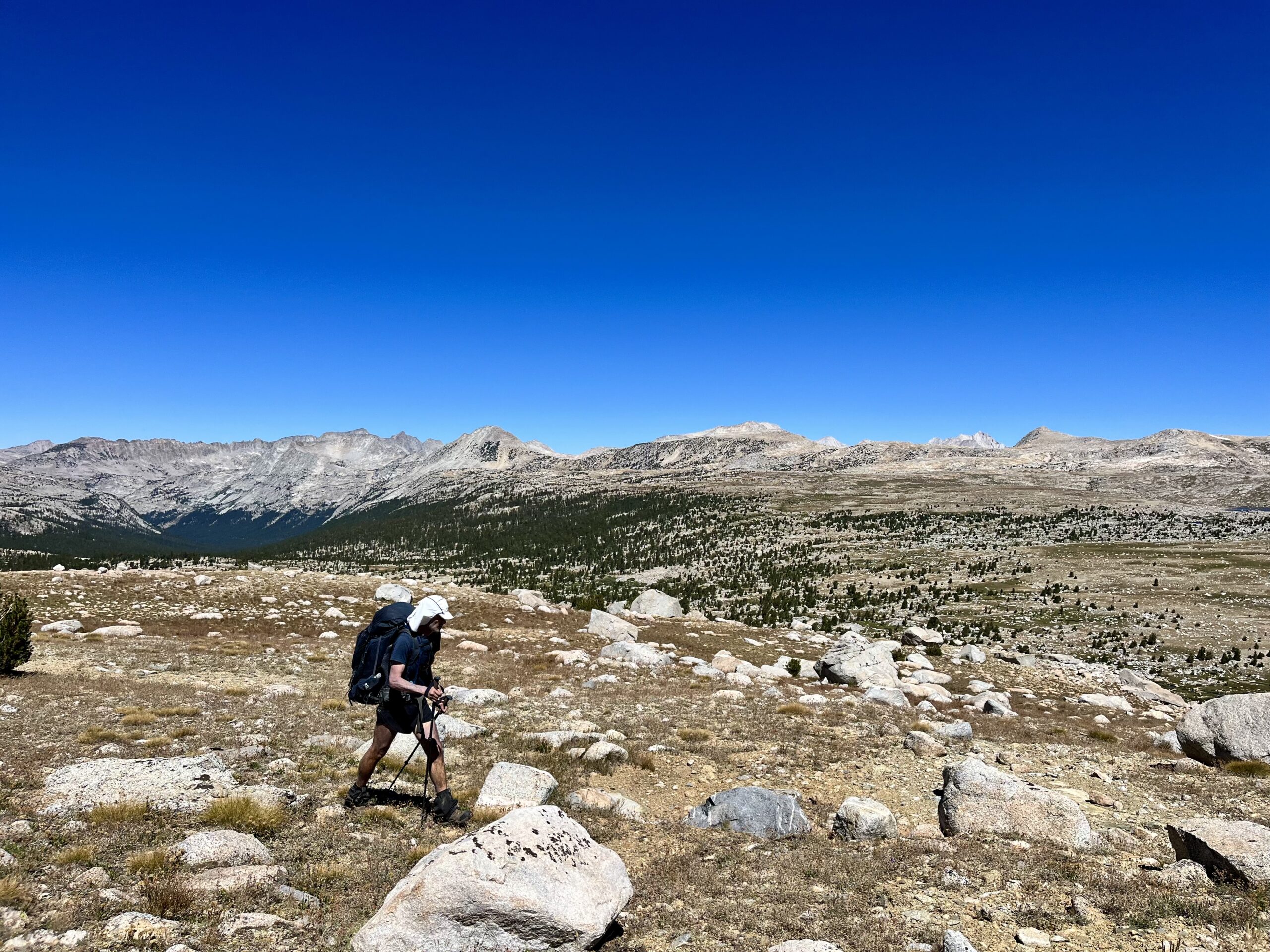 Jim crosses a ridge in the vast Humphrey's Basin.